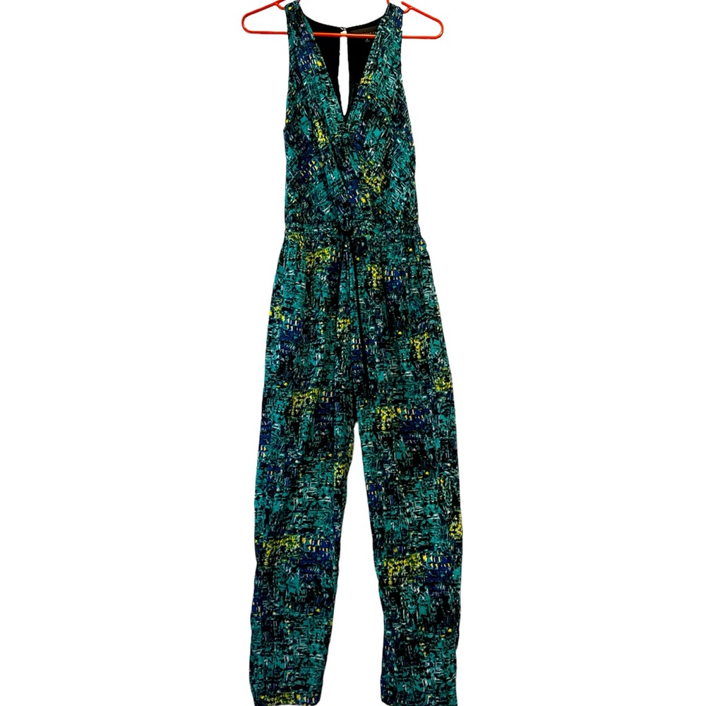 Resort wear teal multi-color jumpsuit with drawstring waist.